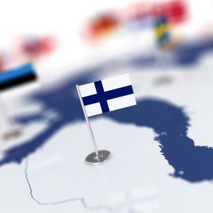 Detail of a globe with Finnish flag