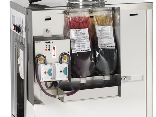 Ice cream machine with fruit sauce device